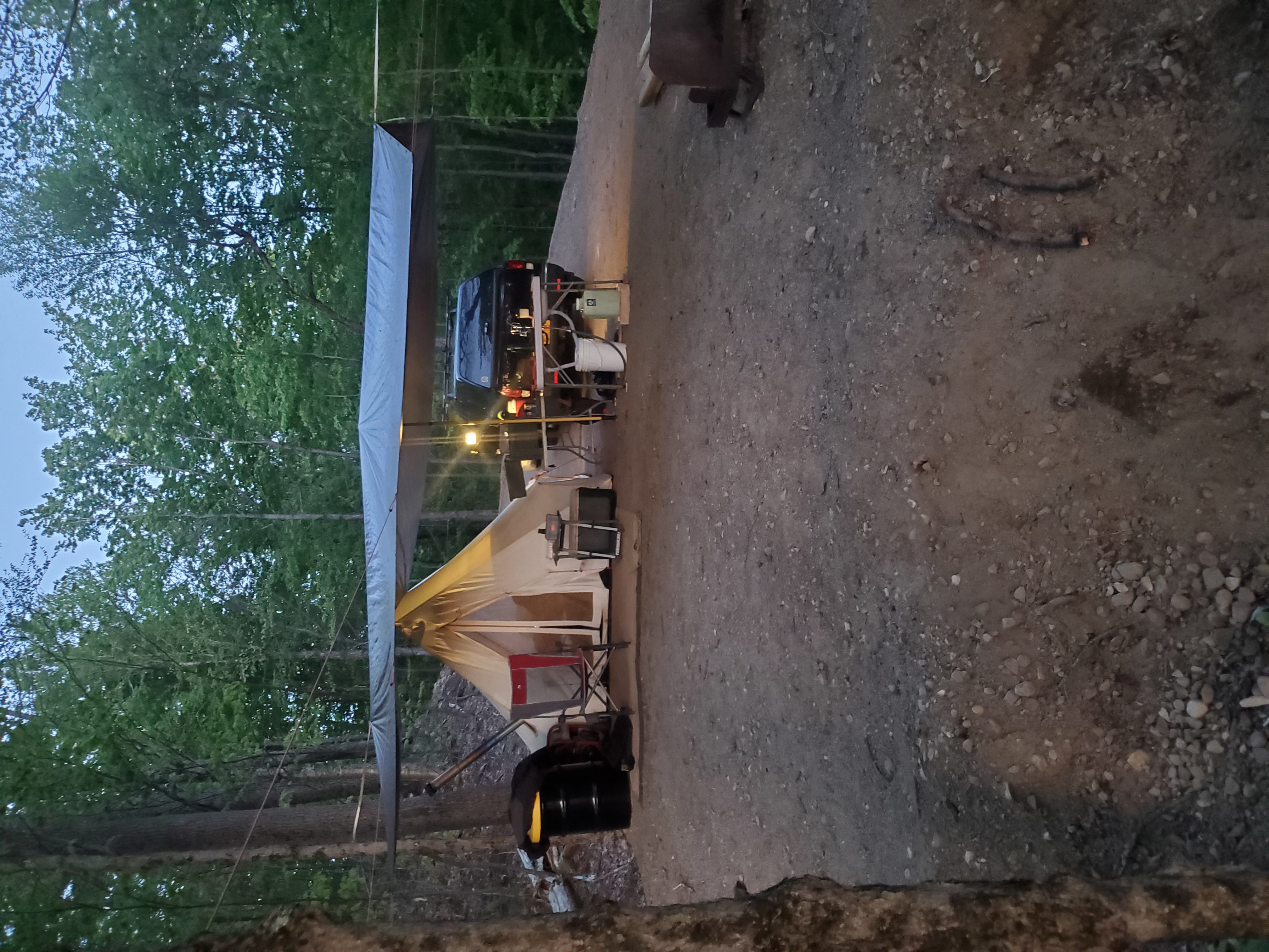 Summer 2023 tent camp at the place under a large tarp